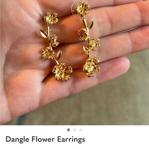 Gold Floral Dangle Earrings - hold